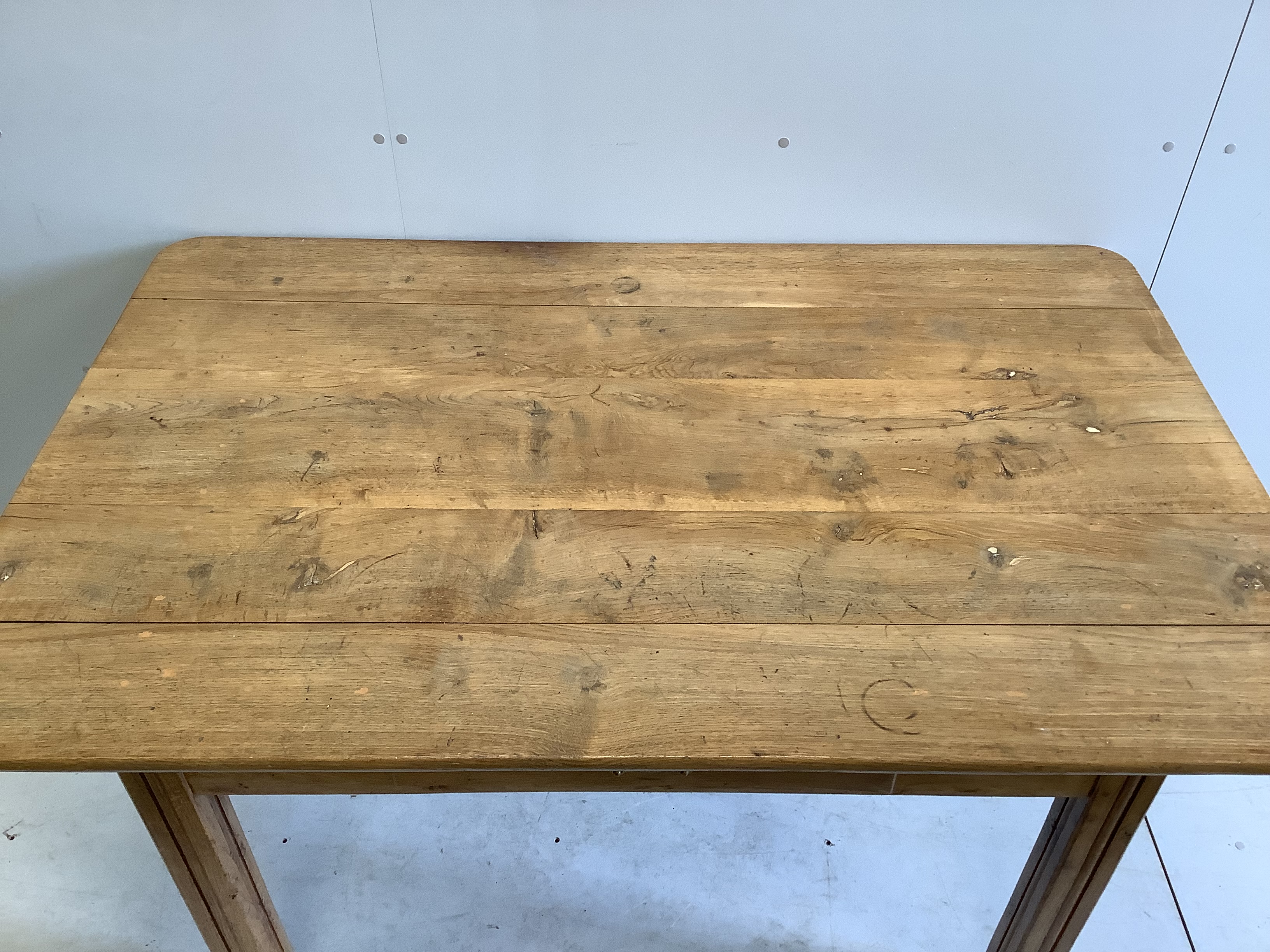 A late 19th century French rectangular oak kitchen table, width 152cm, depth 98cm, height 72cm